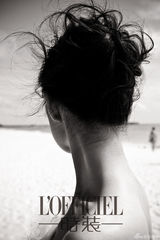 组图：倪妮甜美婚纱登杂志封面 裙摆随风飘逸