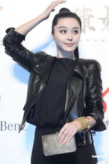 组图：范冰冰道姑头现身影展 陈坤潮装搭配引潮流