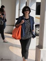 组图：李欣汝时尚街拍 混搭风显潮人范儿