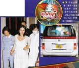 组图：黎姿穿碎花短裙身形未恢复 为保护女儿拒探访