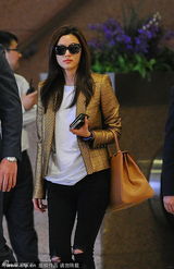 组图：双贤来京 金秀贤低调悲伤全智贤行色匆匆