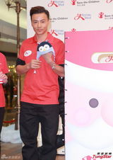 组图：应采儿张晋出席活动大谈育儿心得