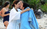 超模可儿携夫抱子海边拥吻 布鲁姆现吻痕(图)