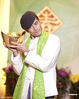 高清图：郭富城贺岁写真频换装望龙年生猛丰足