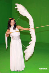 幻灯图：黎耀祥廖碧儿扮财神爱神拍新年宣传片