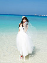 组图：Wondergirls先艺蜜月写真与新郎甜蜜亲吻