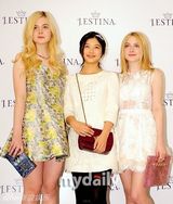 组图：范宁姐妹韩国出席代言活动 与金有贞同台