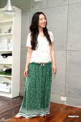 幻灯组图：万芳五年后发新专辑 着绿色长裙春意盎然