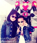 组图：章子怡抱侄女温馨照 帅气小侄儿首曝光