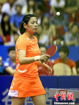 组图：乒球女子攻削大战 中国金花裙装亮相