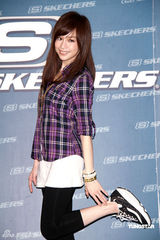 幻灯图：王心凌清新甜美现身 称与范植伟久未联络