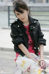 幻灯图：杨幂写真曝光 经典混搭打造另类公主派头