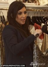 组图：金-卡戴珊硬朗套装遮孕肚 踩高跟鞋血拼