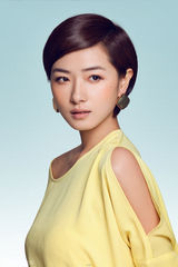 组图：万茜清凉写真 黄衣娇艳性感迷人