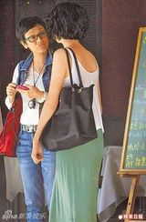 组图：梁洛施复出立即剪短发 戴墨镜封口分手费