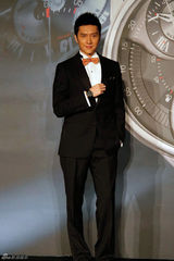 组图：巩俐携尼古拉斯凯奇亮相 优雅大气尽显魅力