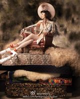 组图：范玮琪慵懒写真变贵妇 罕见短发打麻将