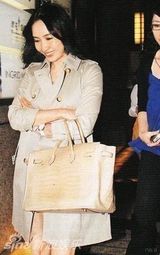 幻灯图：黎姿怀孕6个半月巨肚照曝光 月花30万补身