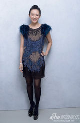 组图：章子怡张东健多伦多拍写真展魅力