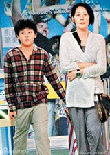 组图：47岁关淑怡时尚冷艳 曝儿子生父是活佛