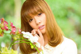 组图：陈怡花仙子写真绚烂 置身花丛青春洋溢