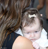 组图：贝嫂为时装周奔忙 桃红礼服配超高跟掀甜美风