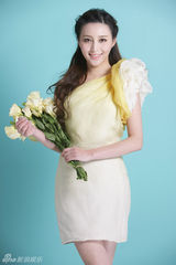 组图：甘婷婷清新春色大片 笑容甜美