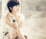 组图：万茜短发写真展性感知性双面气质