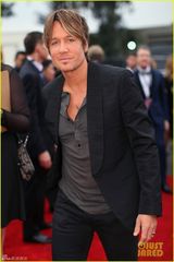 组图：妮可丈夫凯斯-厄本独自亮相 纹身抢眼