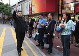 组图：34岁港男子传神模仿金正恩引路人狂拍