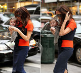 组图：维多利亚抱女儿现身 小7头戴蝴蝶结可爱