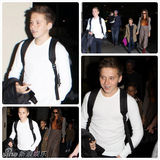 组图：贝克汉姆一家现身机场 小七穿斗篷萌态十足