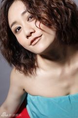 组图：刘芸新写真秀甜美短发 秀辣妈新风范