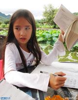 组图：现实版雨林精灵 美丽姐妹花守护西双版纳