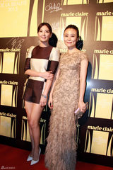 组图：张雨绮着棋盘装亮相 淡妆马尾展东方气质