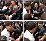 组图：莱昂纳多下体遭偷袭 面露微笑尴尬不已