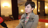 组图：2014两会美女记者众生态 美貌智慧并存