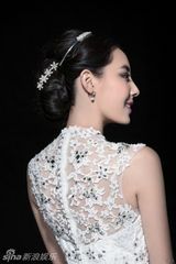 组图：米露蕾丝婚纱写真曝光唯美浪漫