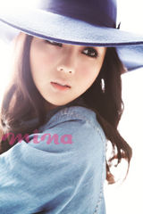 组图：何洁2011经典造型盘点 娇俏酷帅变身双面娇娃