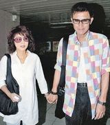 幻灯图：盘点明星坚贞爱情 患难真情相濡以沫