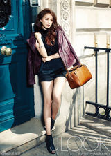 高清图：金泰希（金泰熙）拍慈善写真 蓬发俏丽童趣