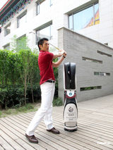 幻灯图：郭富城捧场明星高球赛 接受伍兹前教练特训