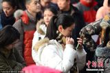 组图：高校艺考大幕开启 美女帅哥冒雪赶考