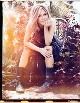 组图：詹妮弗-安妮斯顿登杂志封面展招牌笑容