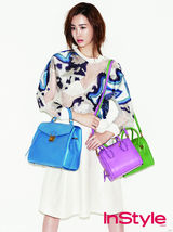 组图：韩星李多海时尚大片 黑白透视装秀好身材