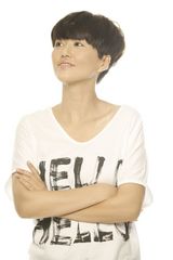 组图：谭维维环保大片 清新演绎《在束河里》