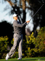 高清图：伍兹丑闻曝光后首次亮相 展招牌笑容