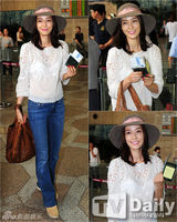 组图：孙泰英赴中国拍电影 白色透视装现身机场