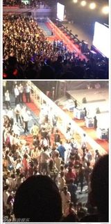 现场组图：张信哲梁静茹演唱会被扔水瓶凳子