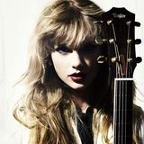 组图：泰勒熟女杂志写真 电眼红唇露纤纤玉腿